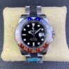 Stunning Rolex Submariner with gold accents and luminous hands on display
